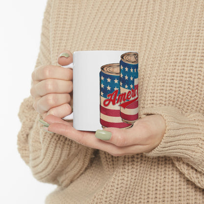 White mug with "America" text and US flag design on two cans.