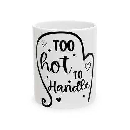 White mug with black text "TOO hot TO Handle" and decorative hearts.