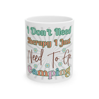 Mug with "I Don't Need Therapy I Just Need To Go Camping" and floral design.