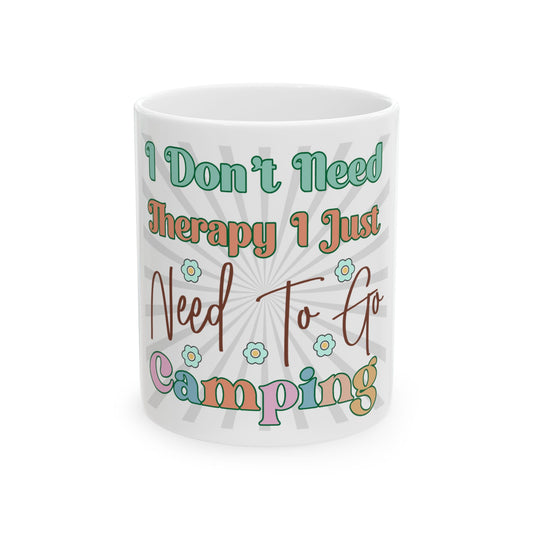 Mug with "I Don't Need Therapy I Just Need To Go Camping" and floral design.