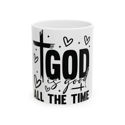Mug with "GOD is good ALL THE TIME" text, cross, and hearts.
