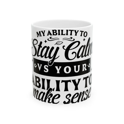 White mug with black text: "My ability to stay calm vs your ability to make sense."