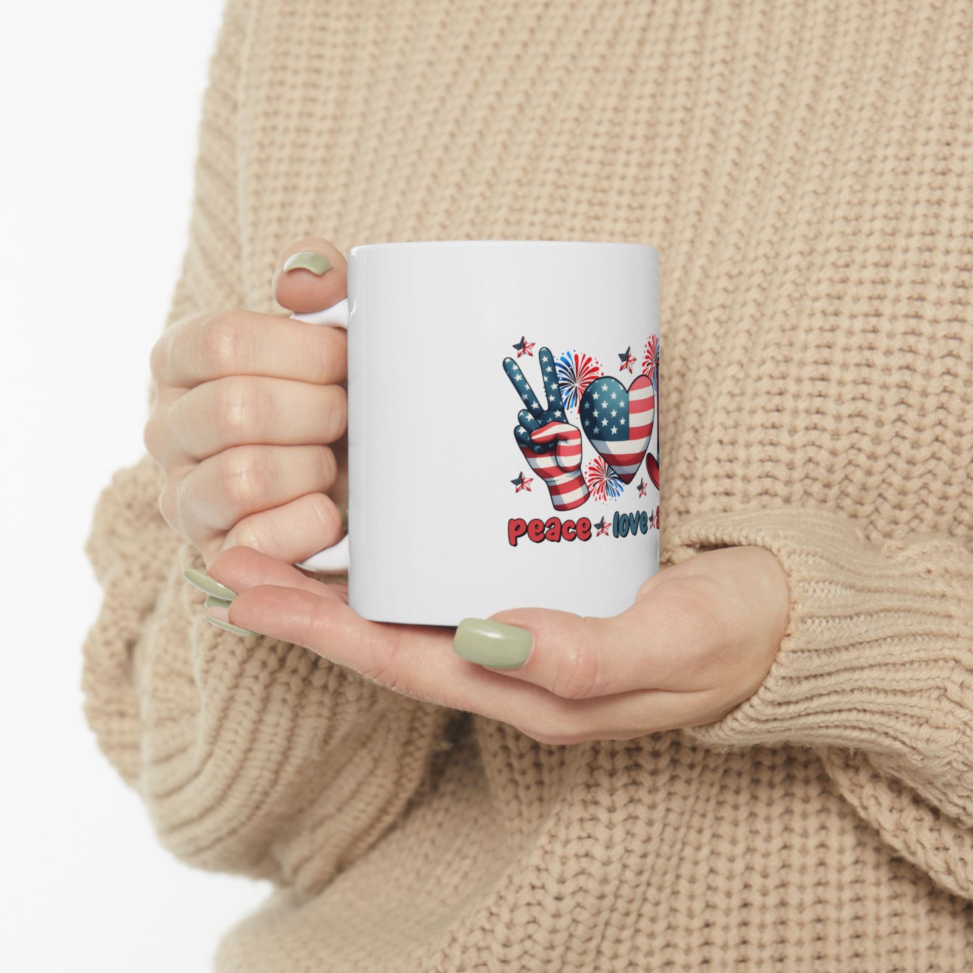 White mug with "peace & love" text and patriotic graphics.