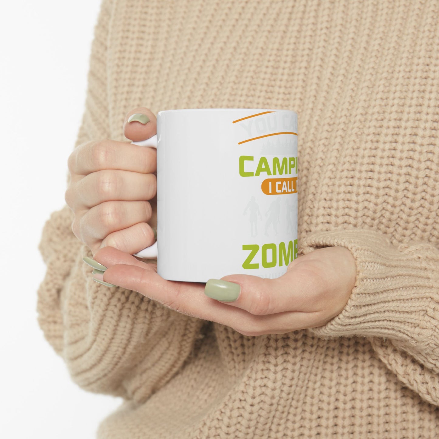 White mug with text "CAMPING I CALL ZOMBIE".