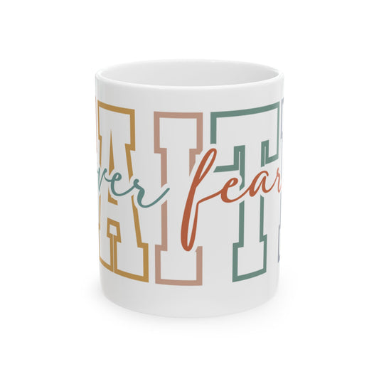 White mug with "Never Fear" text in colorful block letters.