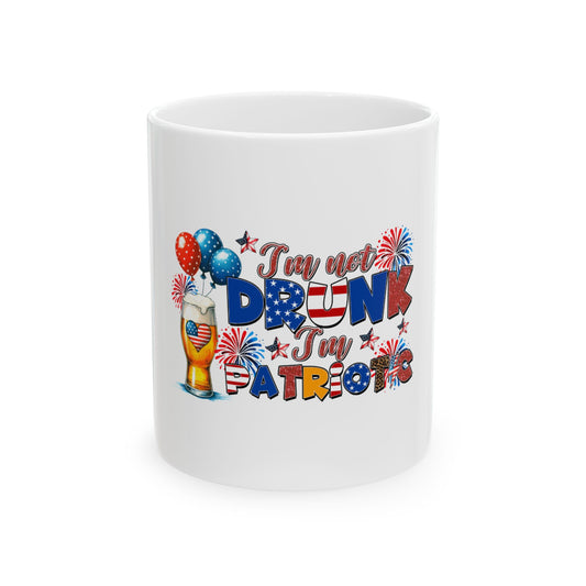 White mug with patriotic "I'm not drunk, I'm just patriotic" text and fireworks.