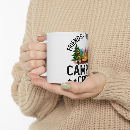 White mug with "FRIENDS FIRE CAMP CREW" text and camping graphic.