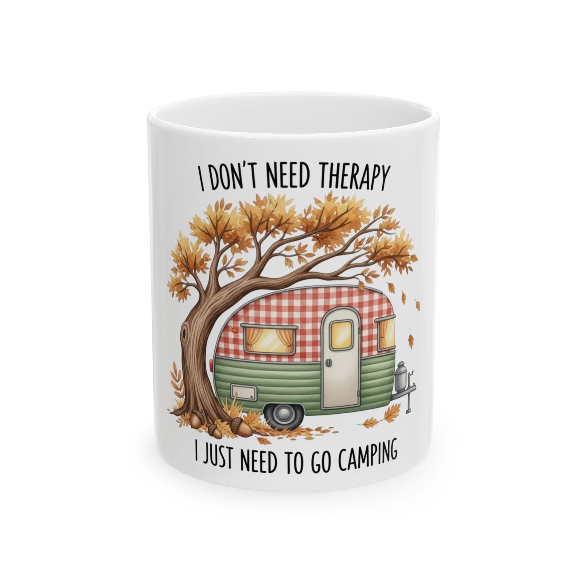 Mug with a camper, tree, and falling leaves; text: "I DON'T NEED THERAPY I JUST NEED TO GO CAMPING."
