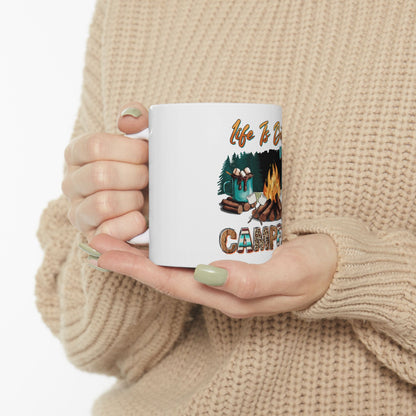 White mug with campfire and "Life is Better a Camper" text.