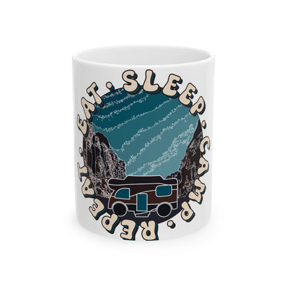 Mug with "Eat. Sleep. Camp. Repeat." text and RV in starry mountain landscape.