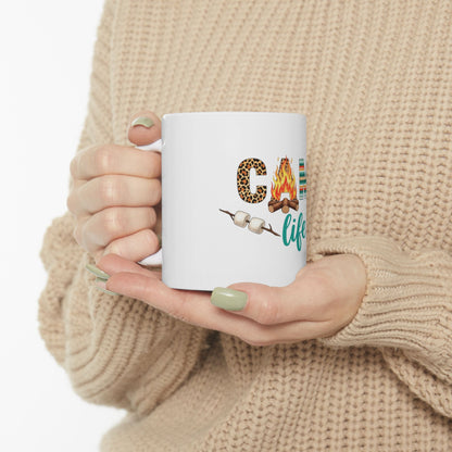 White mug with "Camp Life" text and marshmallow graphics.