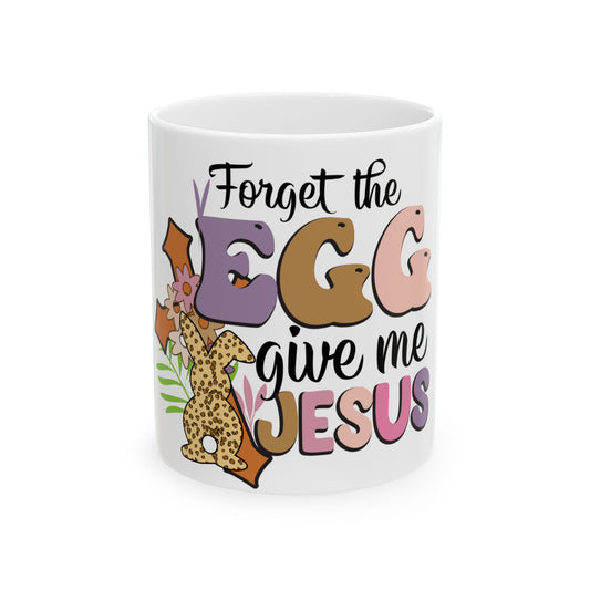 Mug with "Forget the EGG give me JESUS" text and Easter-themed graphics.