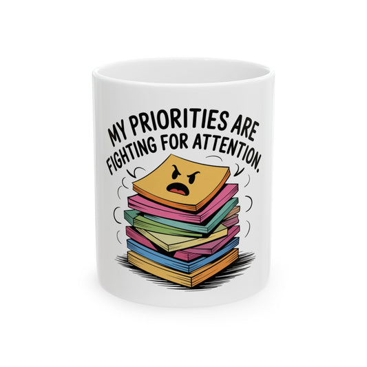 Mug with stack of colorful sticky notes and text "MY PRIORITIES ARE FIGHTING FOR ATTENTION".