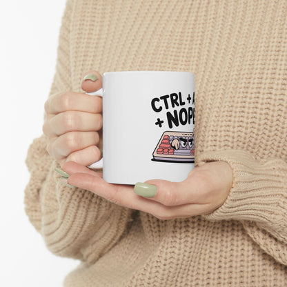 White mug with keyboard keys and "CTRL+ NOPE" text.