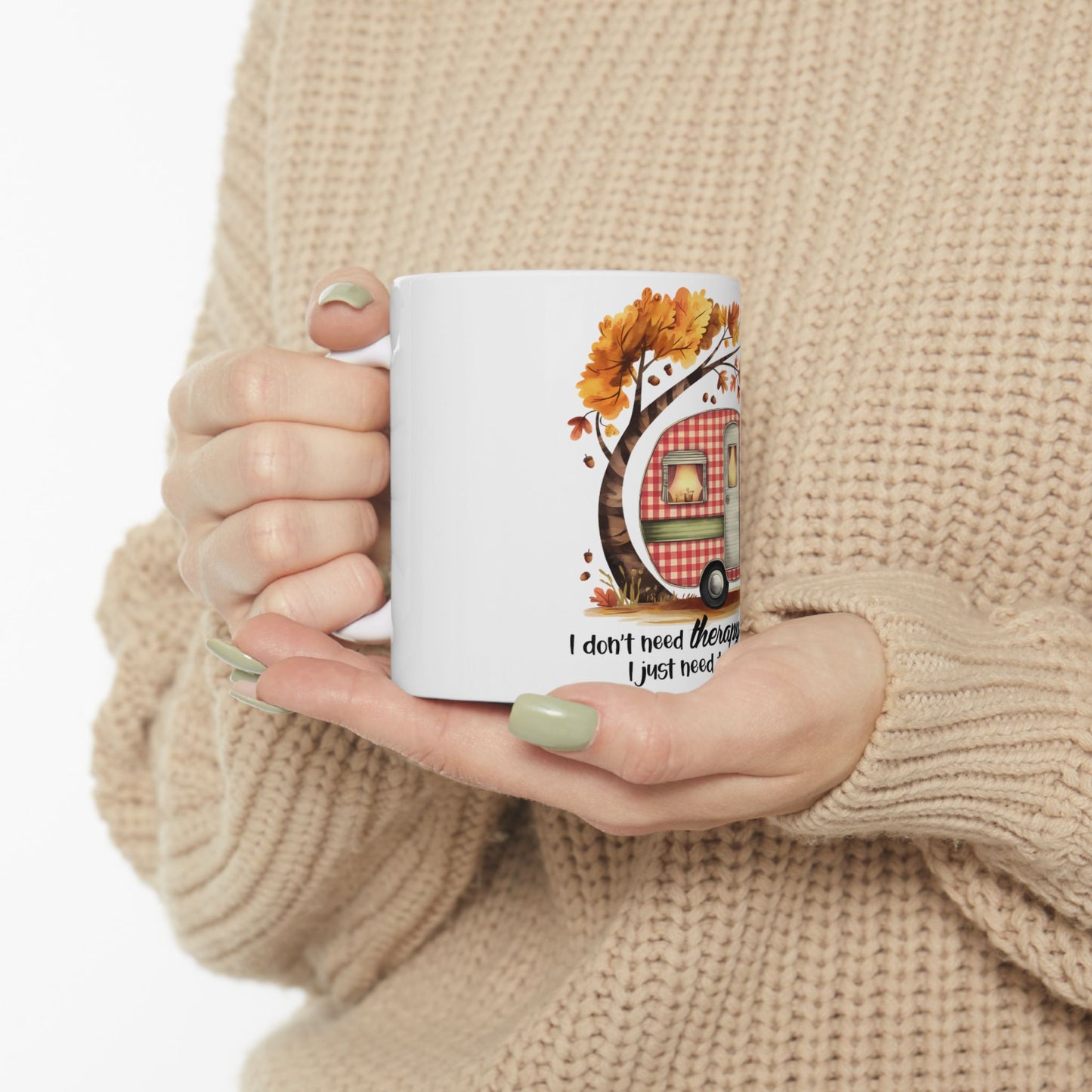 Mug with autumn camper illustration and text "I don't need therapy I just need".