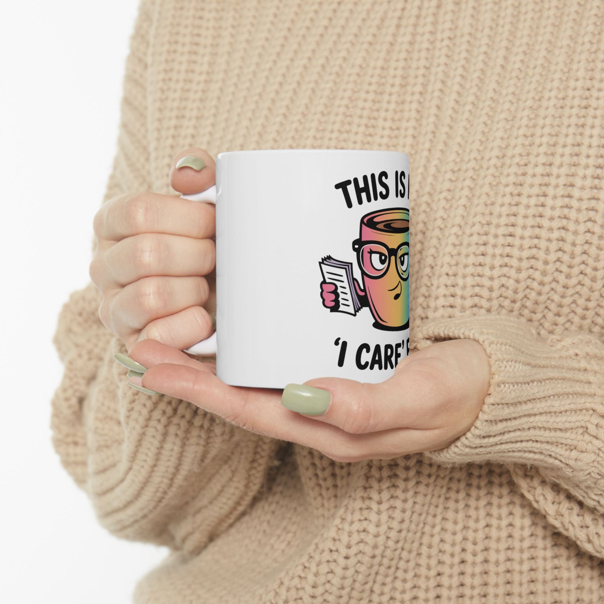 White mug with cartoon character and text "This is I care".