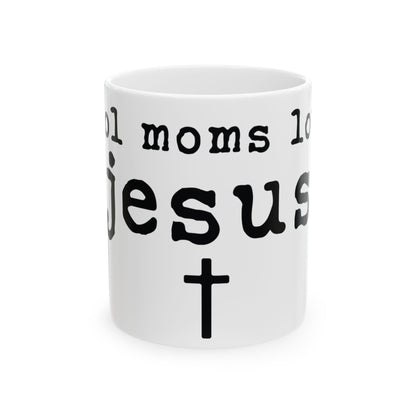 White mug with black text that reads "Cool moms love Jesus" and a cross.
