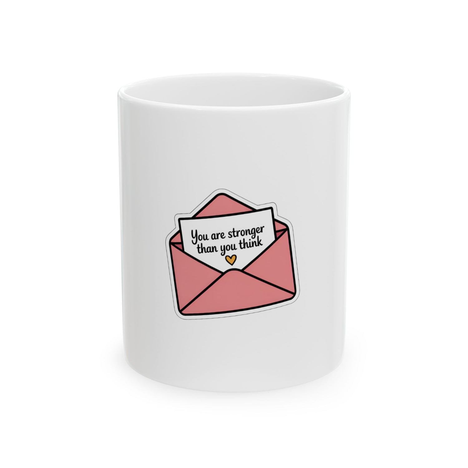 White mug with a pink envelope sticker saying "You are stronger than you think".