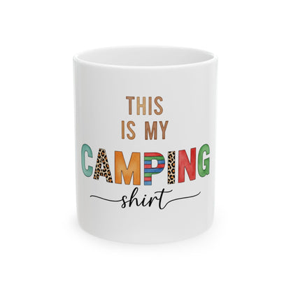 Mug with colorful text "THIS IS MY CAMPING shirt" in playful font.