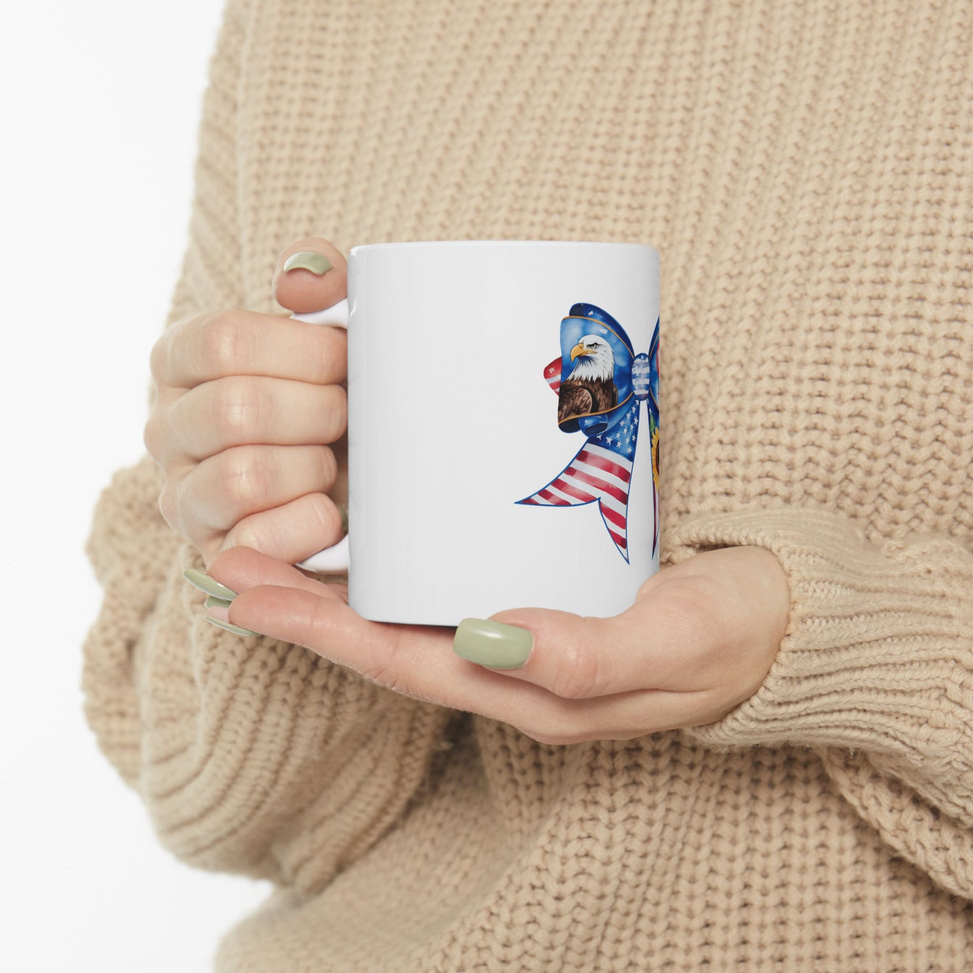 White mug with patriotic bow design featuring eagle and American flag.
