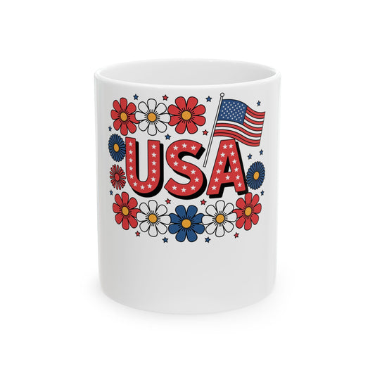 White mug with "USA" in patriotic colors and floral accents.