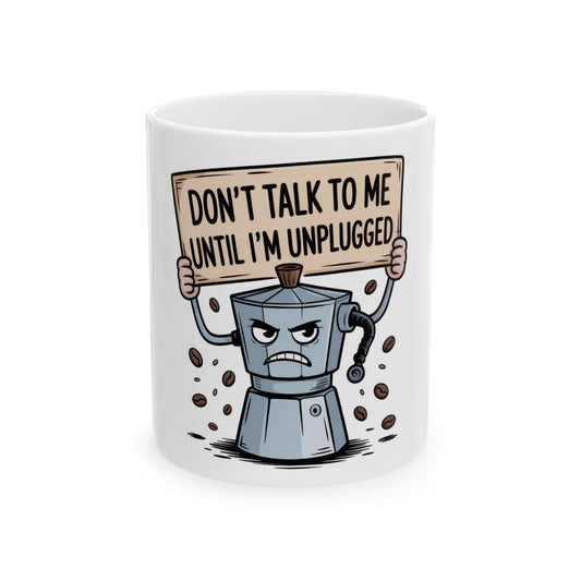 Moka pot with angry face holding sign that reads "Don't talk to me until I'm unplugged."