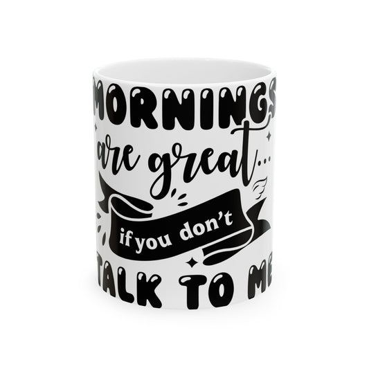 White mug with black text reading "Mornings are great if you don't talk to me".