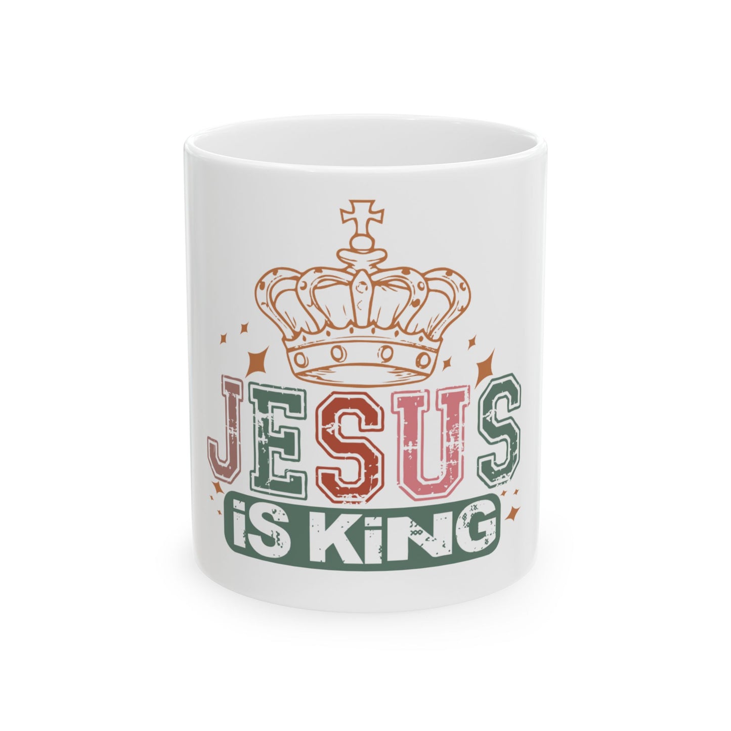 White mug with "JESUS is KING" text and crown graphic.
