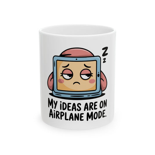 Mug with cartoon computer with tired eyes and text "My ideas are on airplane mode."