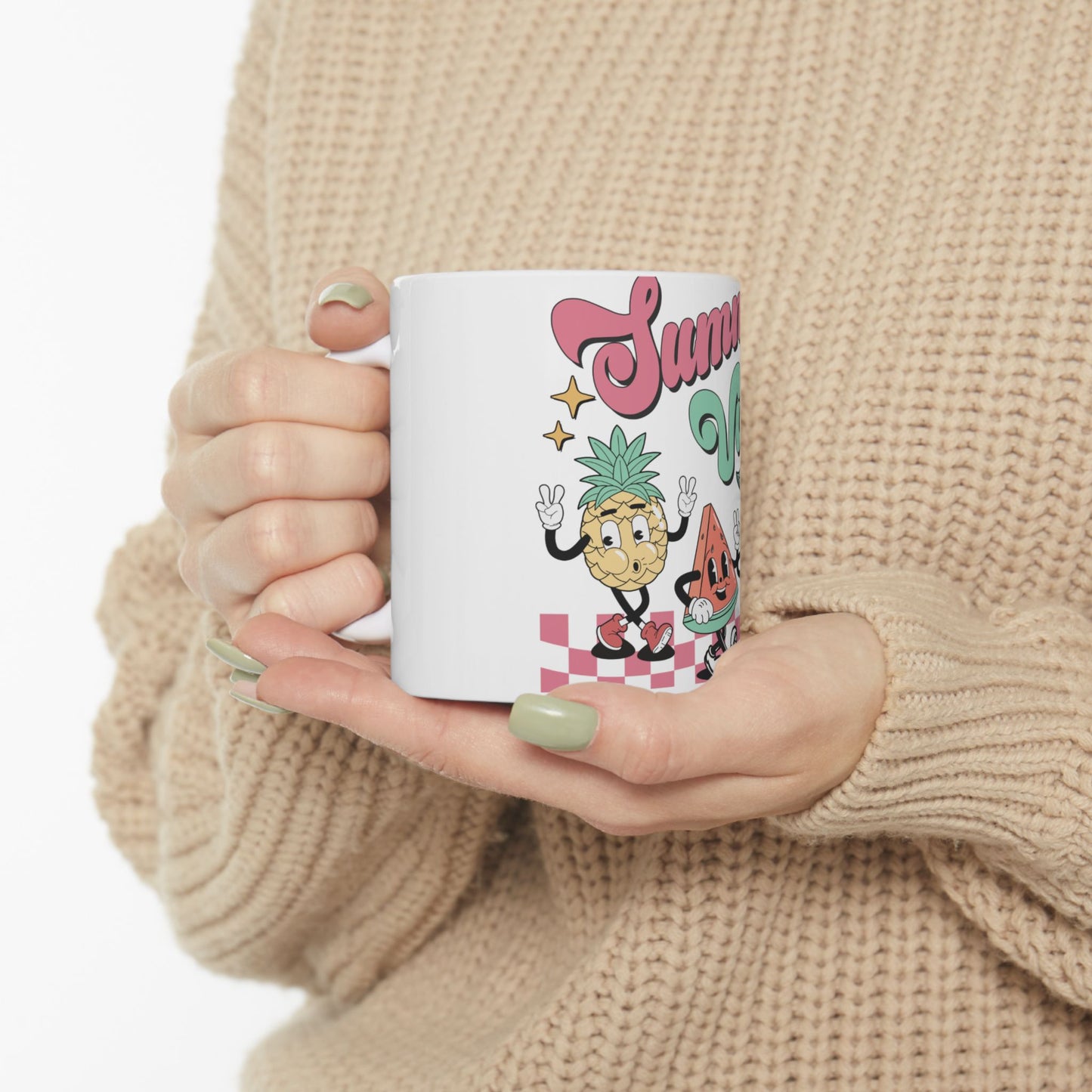 White mug with cartoon pineapple and watermelon characters and "SUMMER VIBES" text.