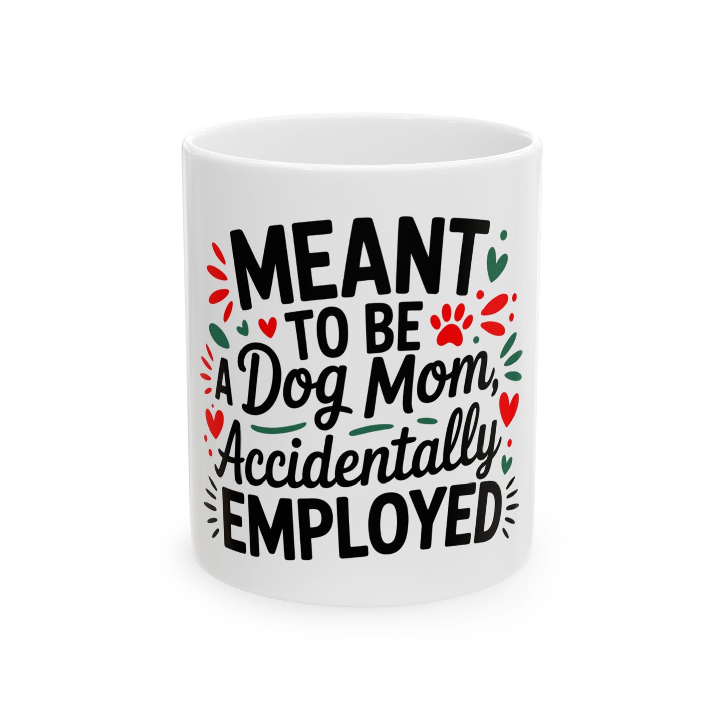 White mug with "Meant to be a Dog Mom, Accidentally Employed" text and paw prints.