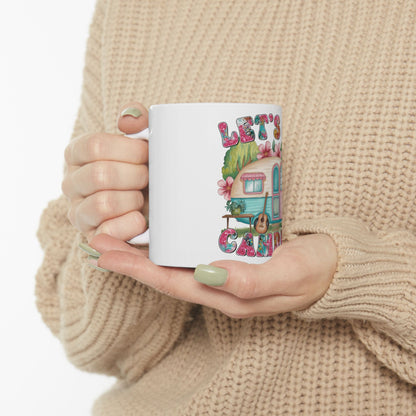 White mug with "Let's Camp" text and a vintage camper illustration.