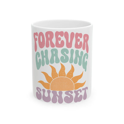 Mug with "FOREVER CHASING SUNSET" text and a stylized sun graphic.
