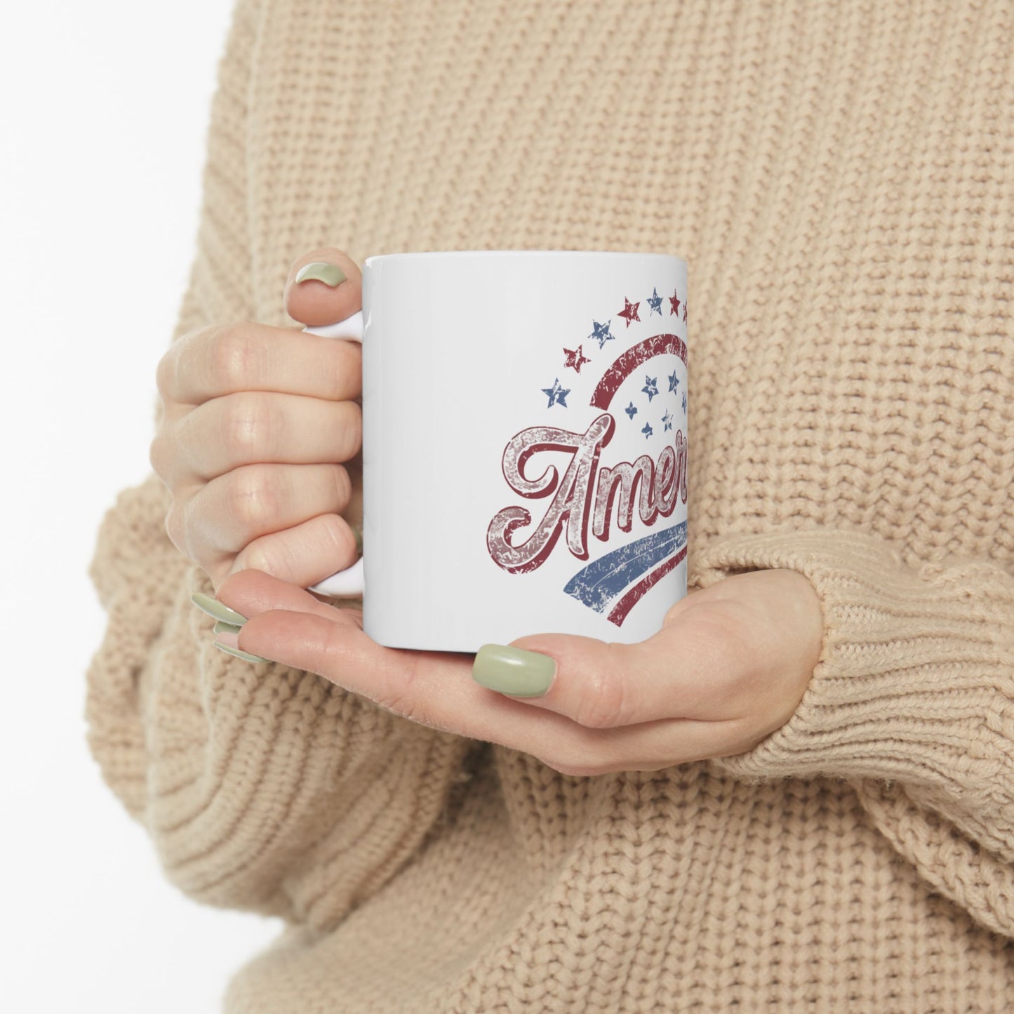 White mug with distressed "America" text and stars design.