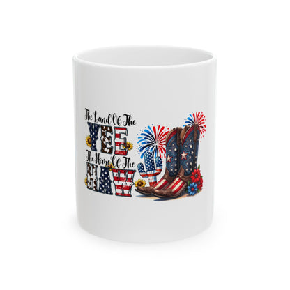 Mug with American flag cowboy boots and patriotic "The Land of the Free, The Home of the Brave" text.