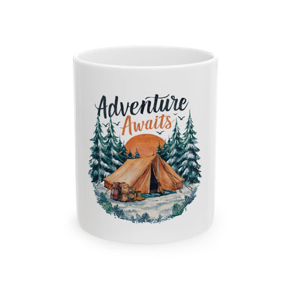 White mug with "Adventure Awaits" text and a camping scene.