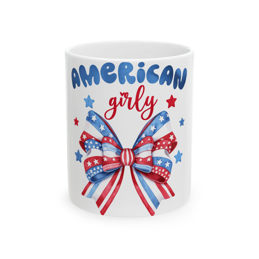 White mug with "American Girly" text and a red, white, and blue bow.