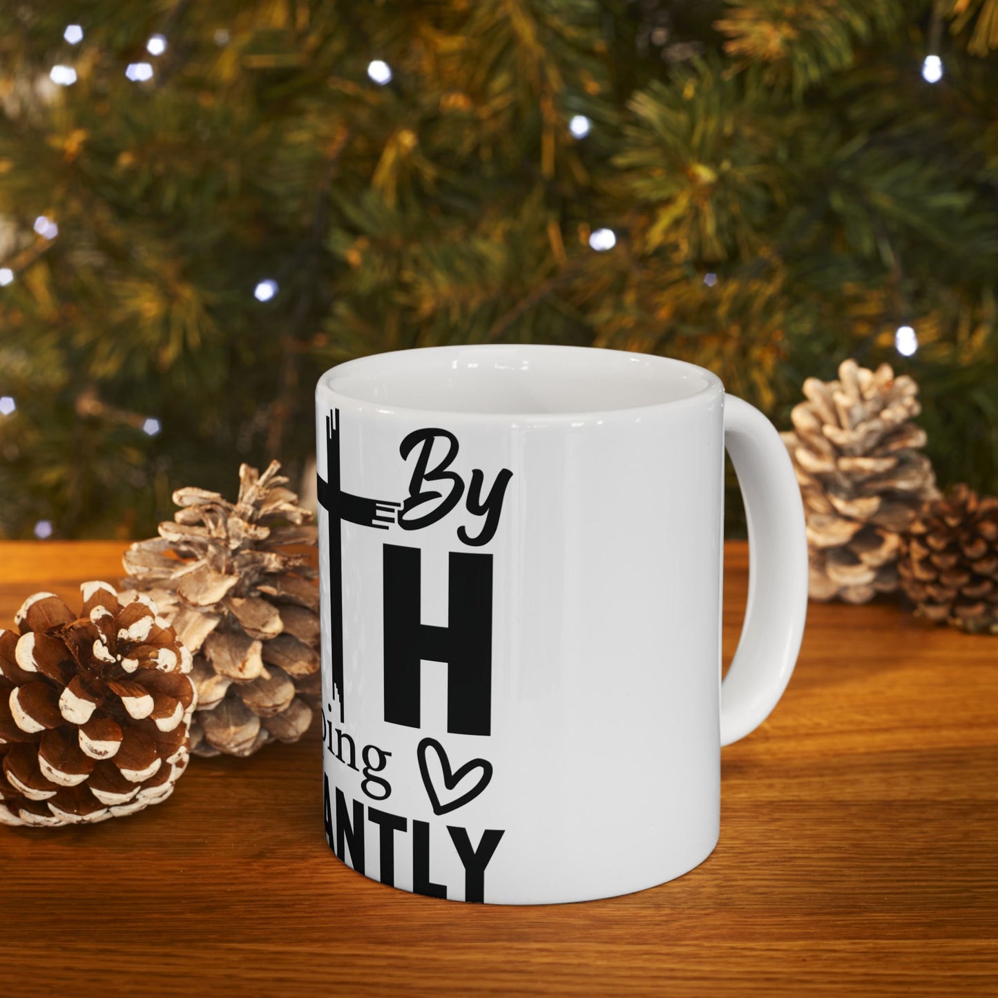 White mug with "Faith is the substance of things unseen" in black text.