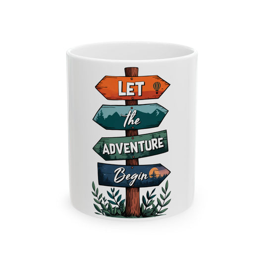 White mug with directional signs reading "Let the adventure begin".
