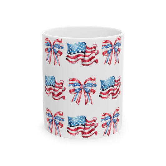 White mug with repeating pattern of American flag bows.