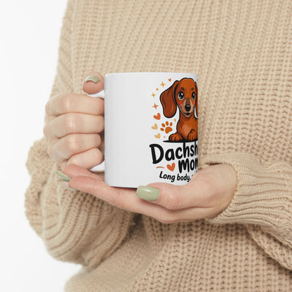 White mug with dachshund illustration and "Dachshund Mom" text.