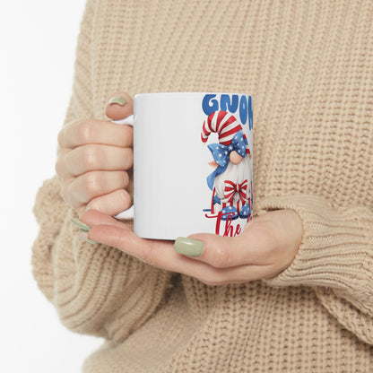 White mug with gnome graphic celebrating Independence Day.