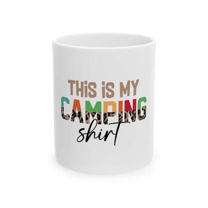 White mug with "This is my CAMPING shirt" text and leopard print.