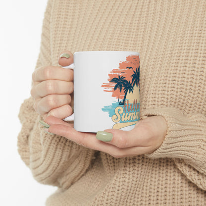 White mug with "Hello Summer" text and a tropical sunset scene.