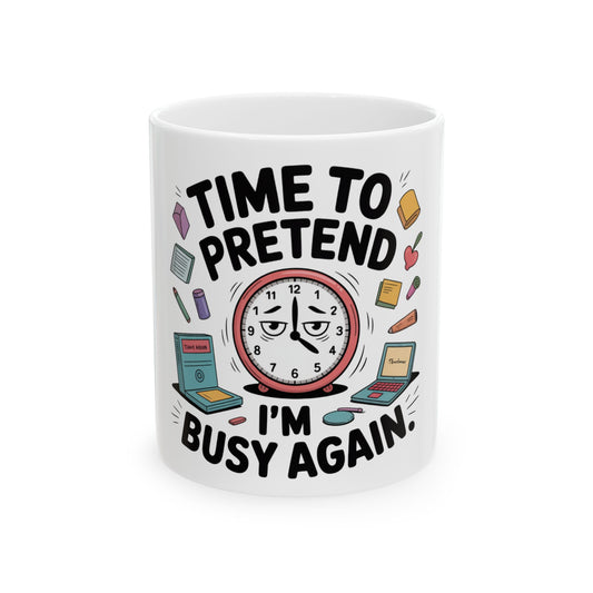 White mug with "Time to Pretend I'm Busy Again" and a clock.