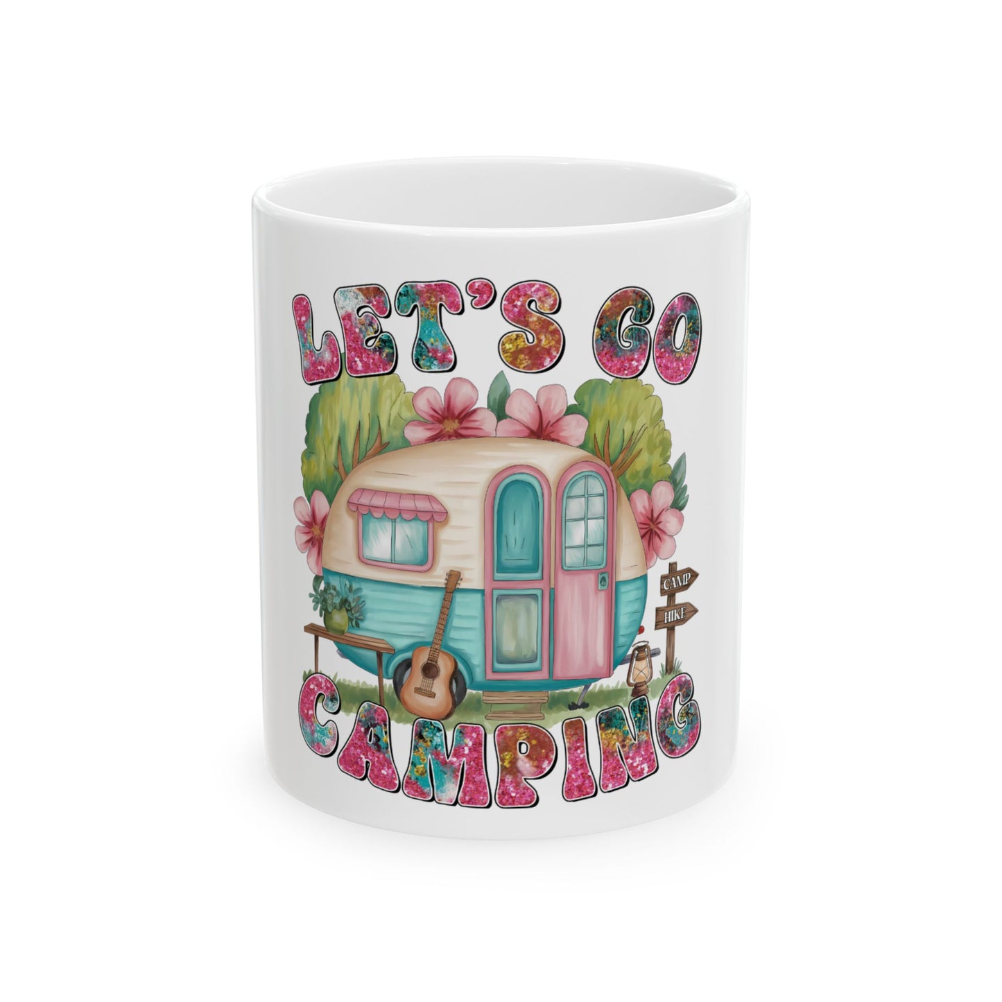 Ceramic mug with "Let's Go Camping" text and illustrated camper van.