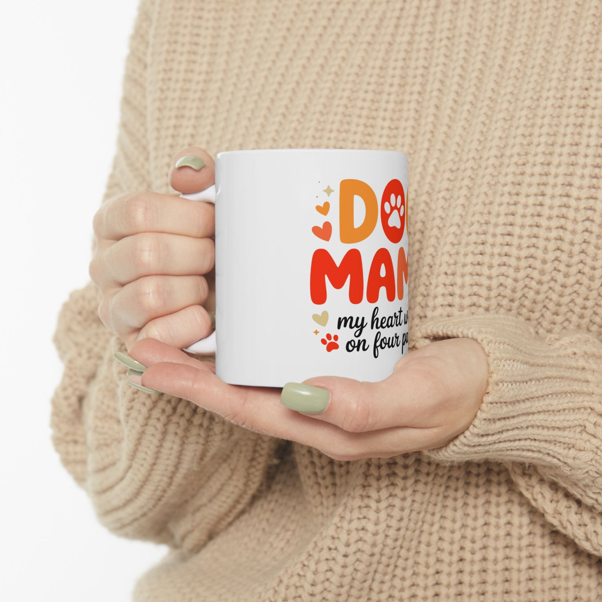 White mug with "Dog Mom" and paw print design.