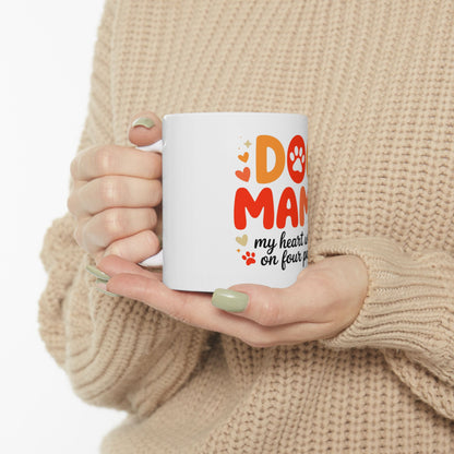 White mug with "Dog Mom" and paw print design.