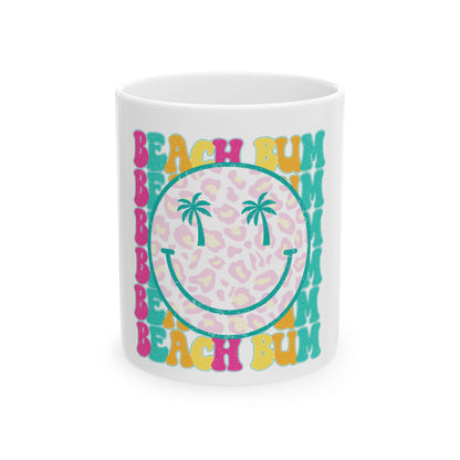 Mug with "Beach Bum" text and palm trees on a leopard print background.