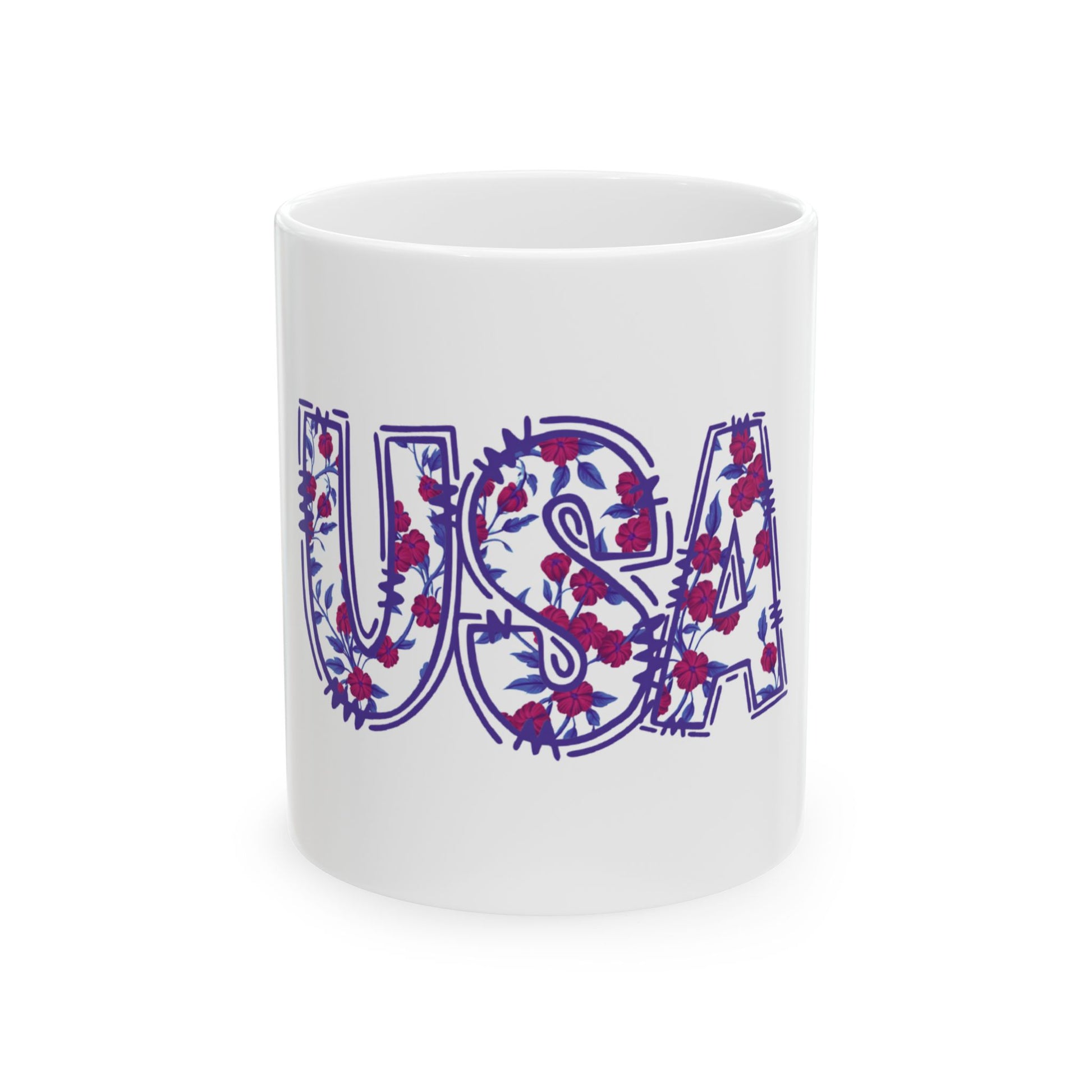 White mug with "USA" in a floral pattern of blue letters and red flowers.